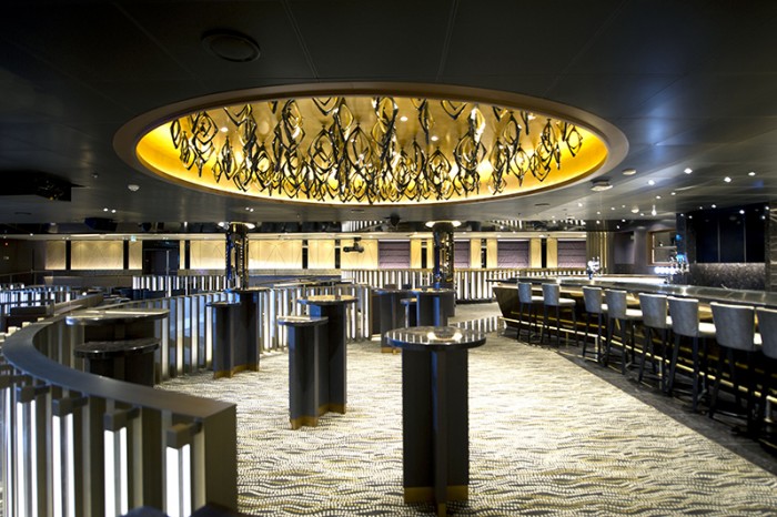 Chelsom produced another illuminated ceiling structure for the Live Lounge bar area featuring a series of sculptural 3D diamonds in gloss black and metallic gold fixed to the ceiling in pairs of smaller and larger sizes to give a more organic look to the piece whilst emitting a soft ambient glow reflected in the gilded ceiling above.